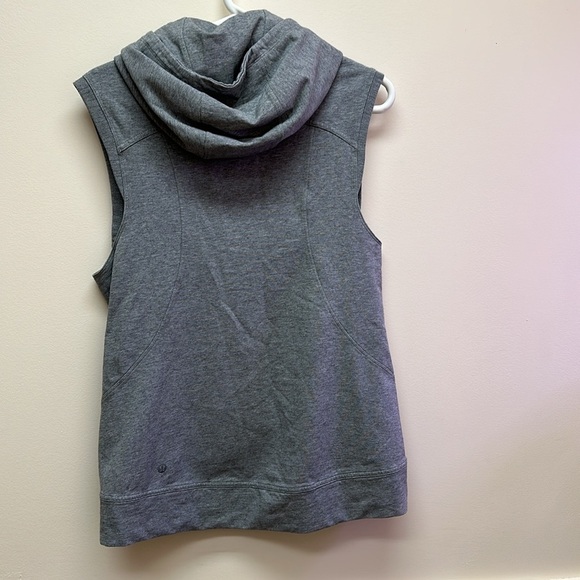 Lululemon | Blissed Out Sleeveless Hoodie
Heathered Grey est size 6-8 (med) - Picture 7 of 9